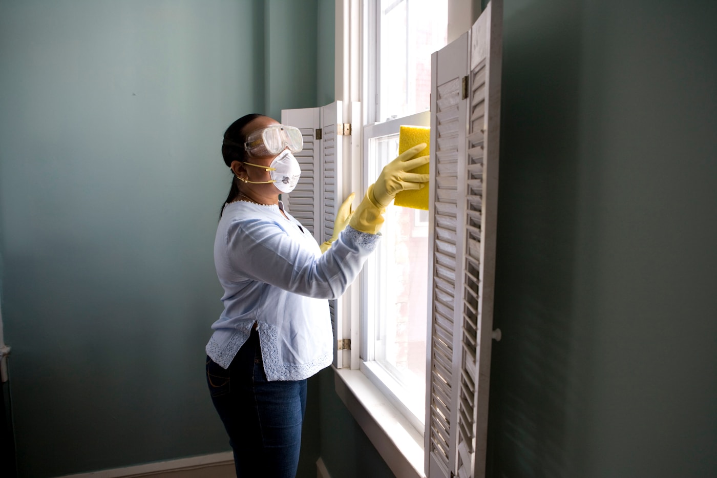 Home professional inspecting a property